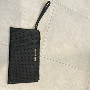 Michael Kors black with gold accent wristlet
